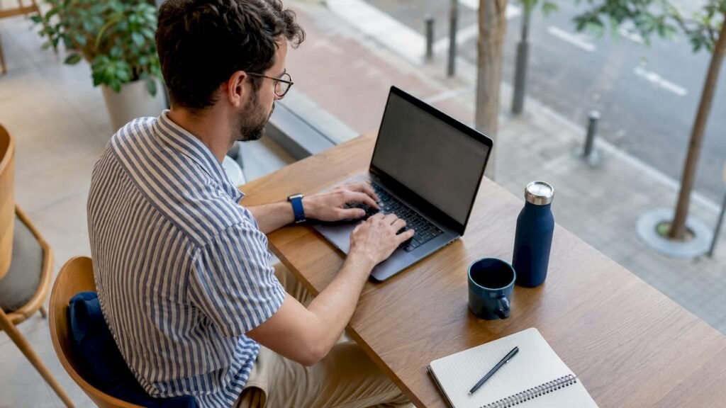 SEO analyst reviewing branded backlink data at desk