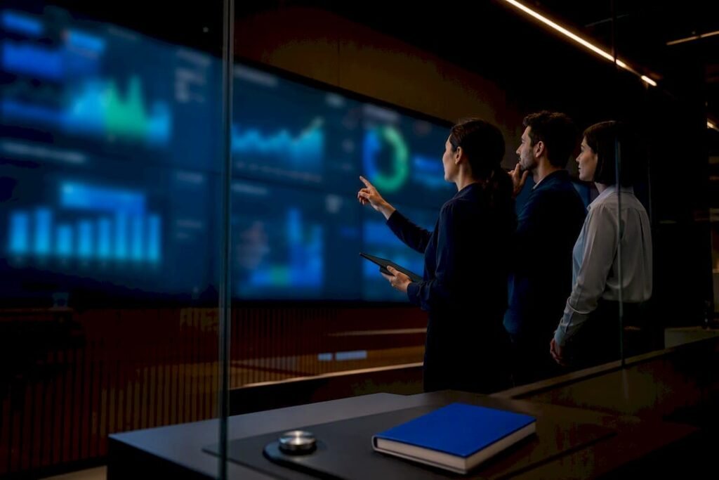 Marketing team reviewing integrated measurement dashboards